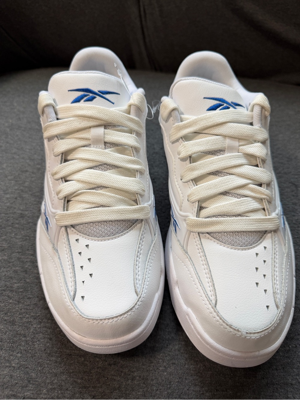 Reebok Men's White Sneakers with Blue Logo Accents